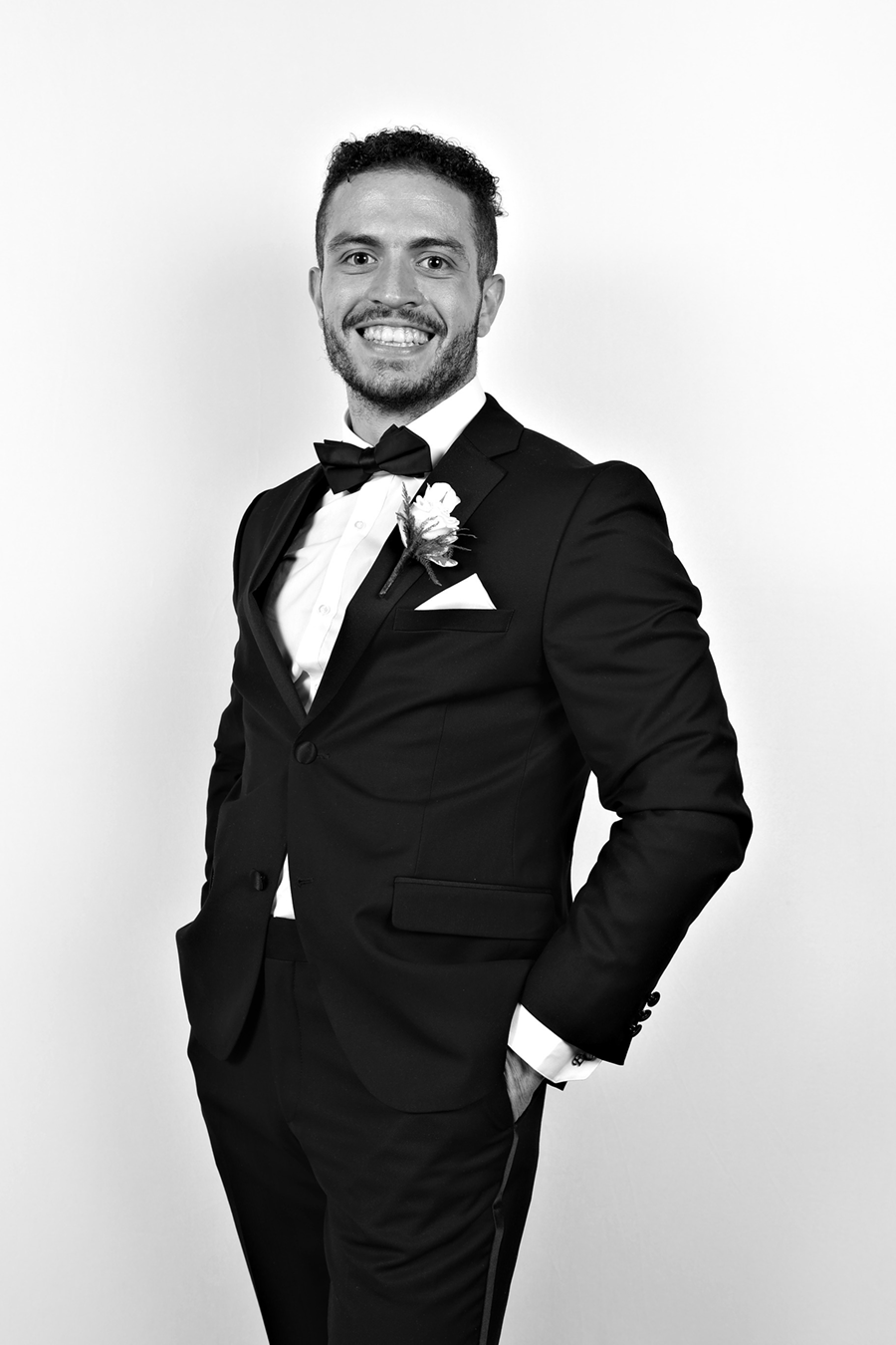 single man at wedding glam portrait lounge b&w
