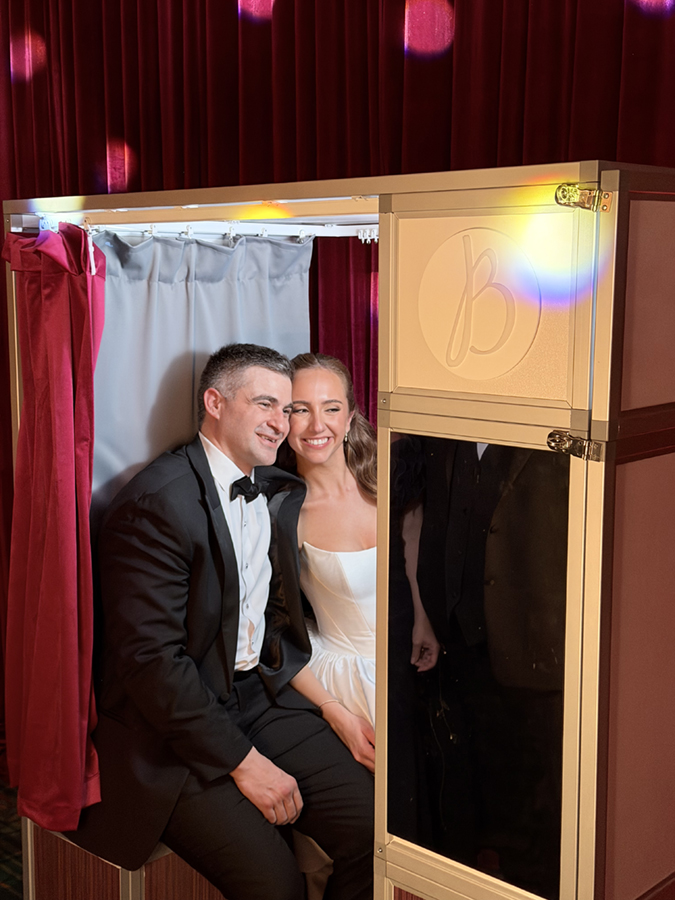 bts couple at red wedding in classic enclosed photo booth